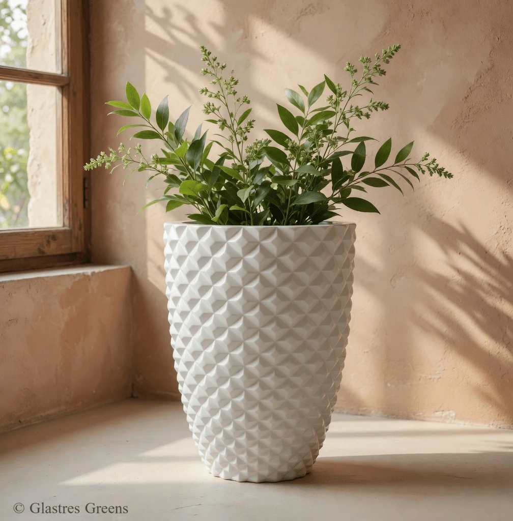 Oversized architectural FRP planter demonstrating dramatic scale in a public plaza