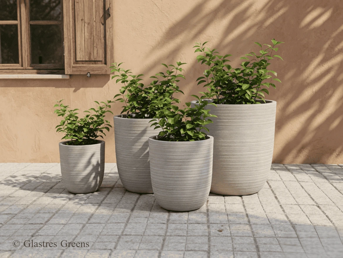 Classic European stone urn-style FRP planter, adding vintage charm to formal villa garden designs and high-end residential entrances.