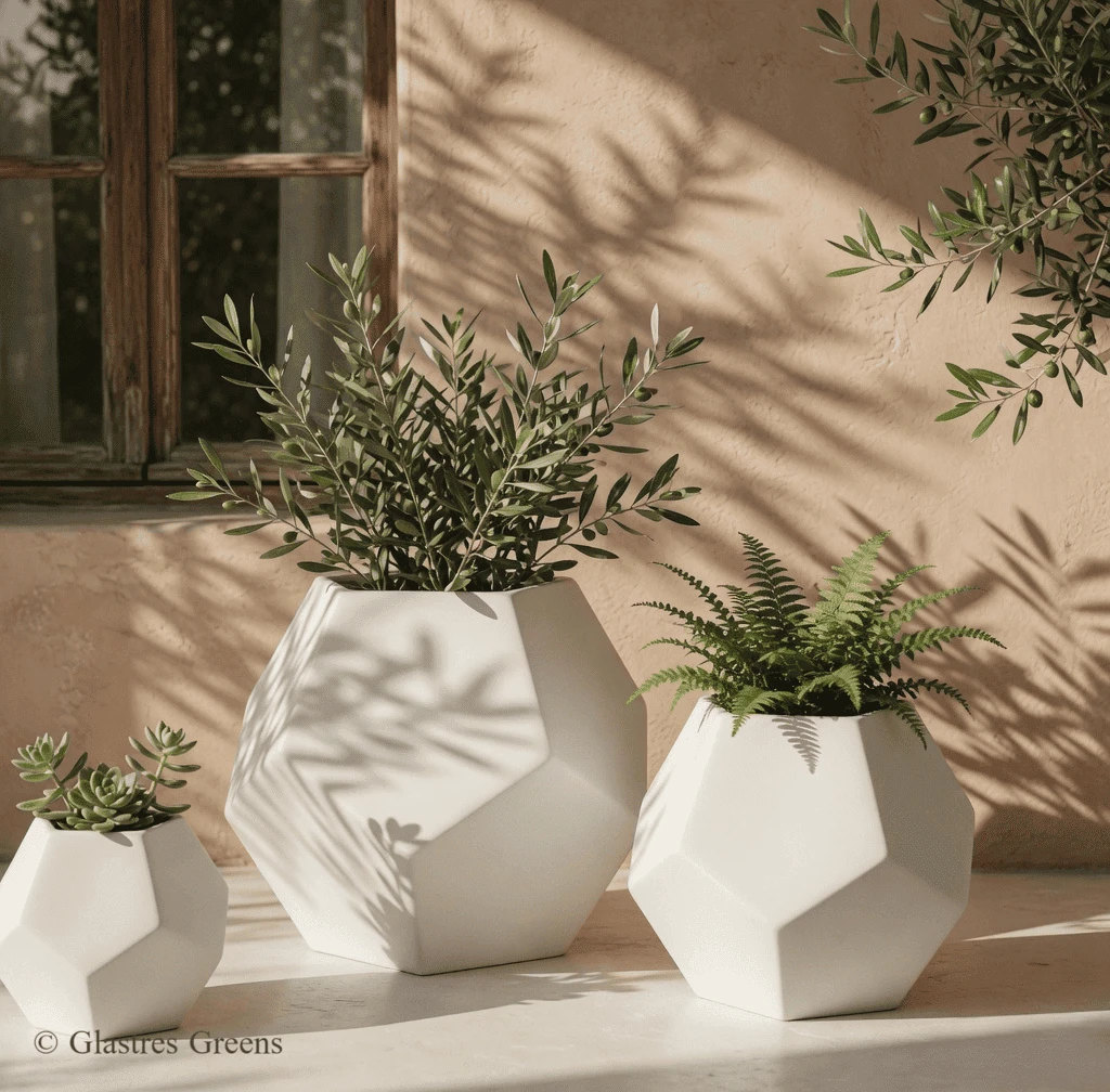 Doric small decorative fiberglass planter drawing heavy influence from classical architecture, perfectly sized for luxury indoor decor and accents.