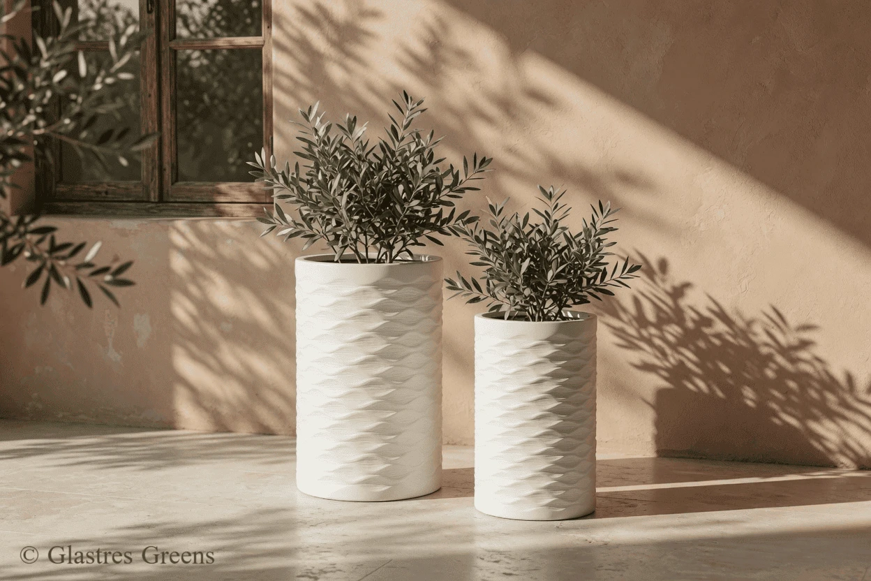 Wave nature-inspired fiberglass planter defined by fluid, organic lines that add a sense of calming motion to premium garden and spa landscapes.